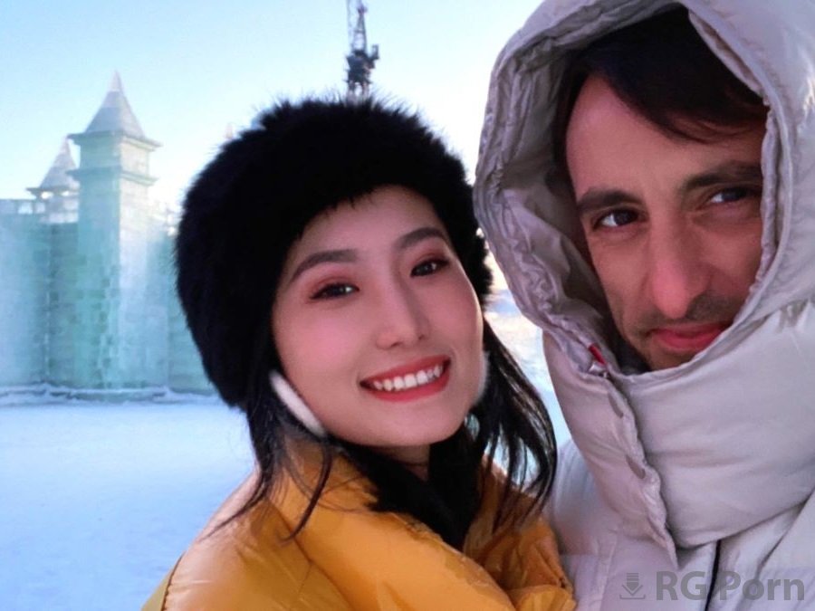 Lonely Meow - Beautiful Asian Woman With European Guy Relaxing At A Ski Resort UltraHD/4K